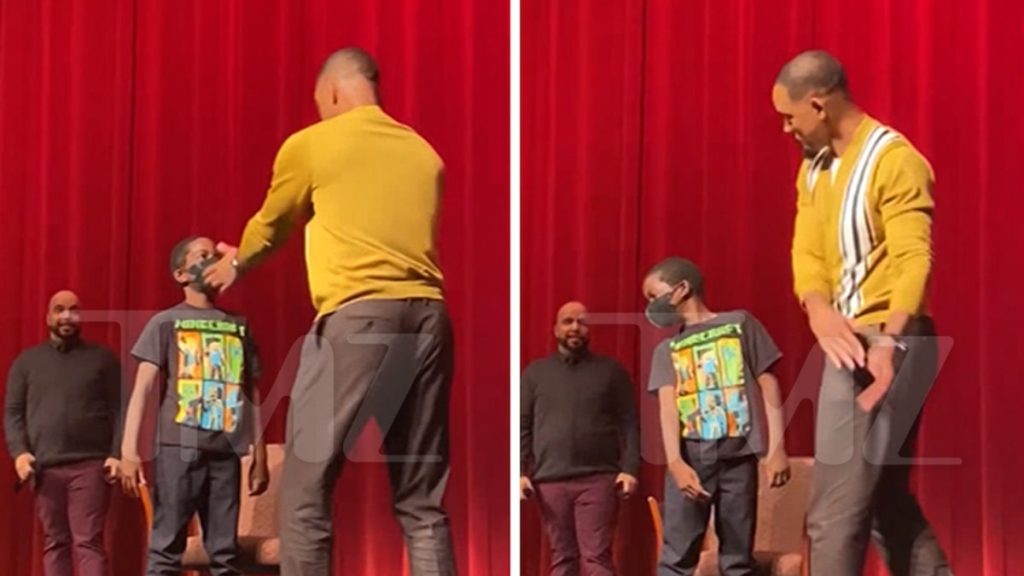 Will Smith loves slapping and shows a fake slap to a young fan