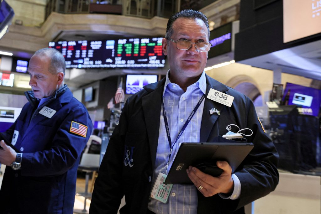 Dow futures fell 300 points as oil prices rose to a 13-year high due to the Russia-Ukraine war