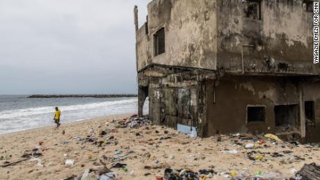 As countries debate who should pay for the climate crisis, a community on the island of Lagos is swallowed up by the sea 