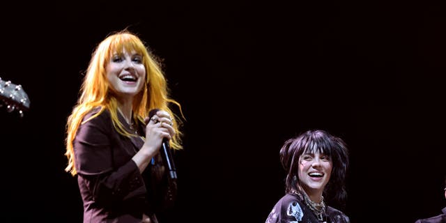 (LR) Hayley Williams and Billie Eilish perform on the Coachella Theater during the 2022 Coachella Valley Music and Arts Festival on April 23.
