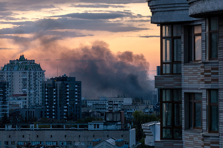 Smoke rises after missiles landed at sunset on April 28, in Kyiv, Ukraine.
