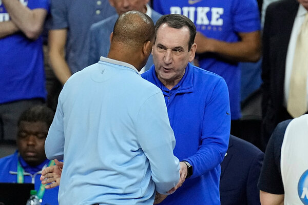 Duke Coach Mike Krzyzewski, right, and North Carolina Coach Hubert Davis speak ahead of their Final Four game in New Orleans.