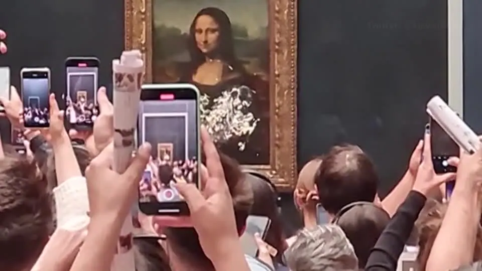 The Mona Lisa was smeared with cream by a man in disguise