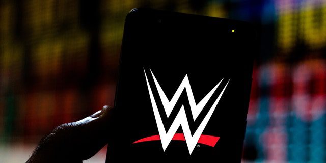 In this infographic, the World Wrestling Entertainment (WWE) logo is shown on a smartphone.