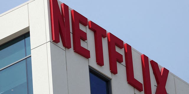 The Netflix logo appears on the side of the building.
