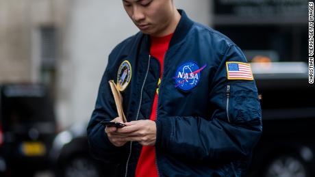 A guest wears a NASA bomber jacket during the London Fashion Week men's collections at Matthew Miller on January 7, 2017 in London, England.