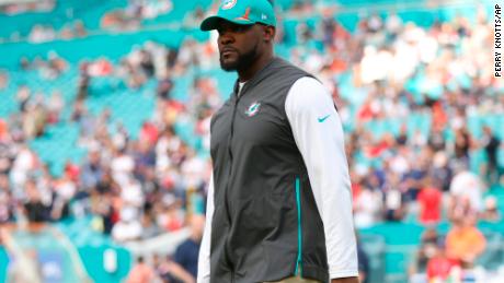 Former Miami Dolphins coach Brian Flores claims he was offered money to keep his cool after the shooting