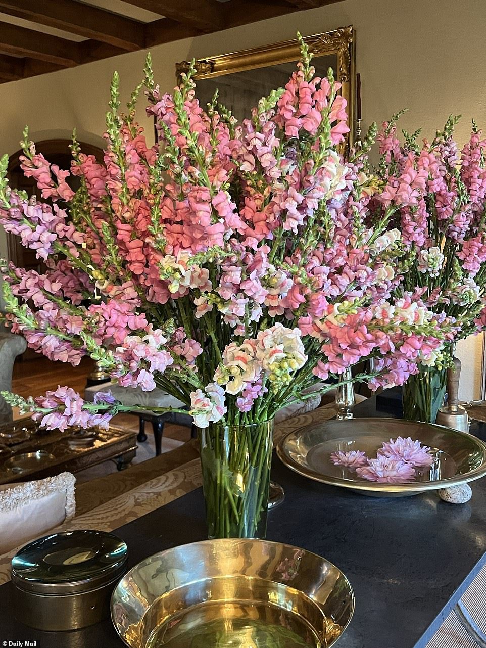 Gorgeous: Martha had pink and white floral arrangements along the tables too