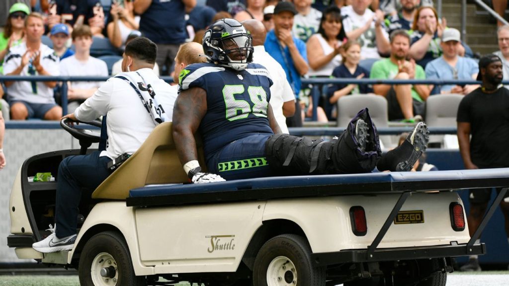 Damian Lewis of the Seattle Seahawks walked off the field with an ankle injury.  X-ray negative