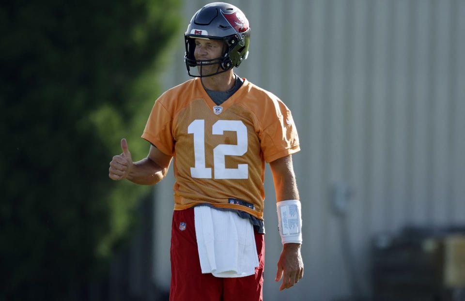 27 July 2022;  Tampa, Florida, USA;  Quarterback Tom Brady (12) reacts for the Tampa Bay Buccaneers during training camp at Advent Health Training Complex.  Mandatory credit: Kim Klement-USA TODAY Sports
