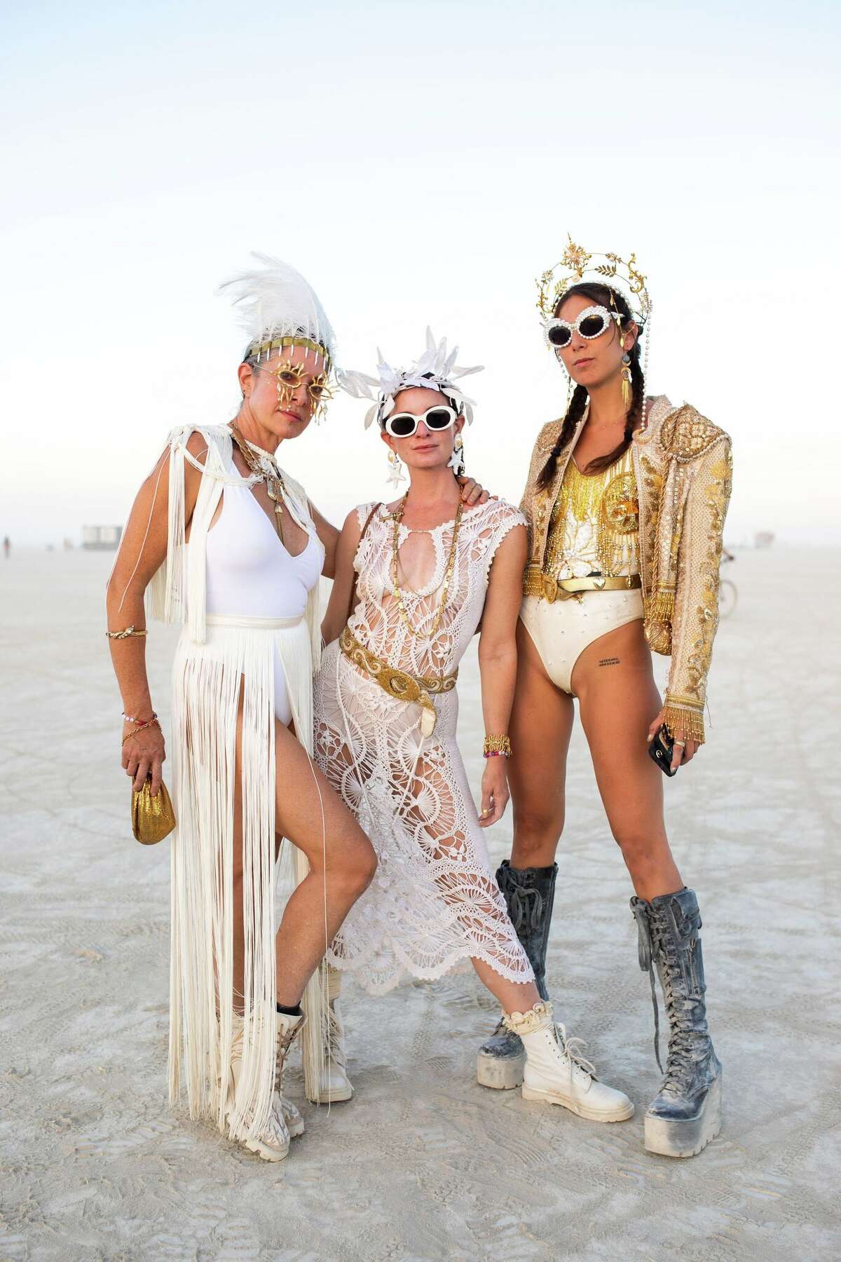 bethielle, @3casascareyes and ravenkauffman at Burning Man 2022 in the Black Rock Desert in Gerlach, Nevada.