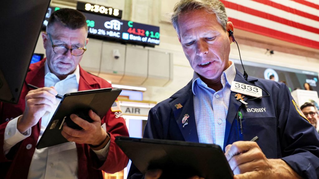 Stock futures drop as investors wait for big tech profits