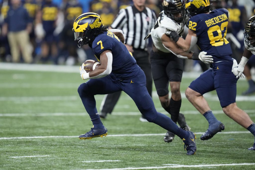 Michigan edge out Purdue to win their second straight Big Ten title, sealing the CFP berth