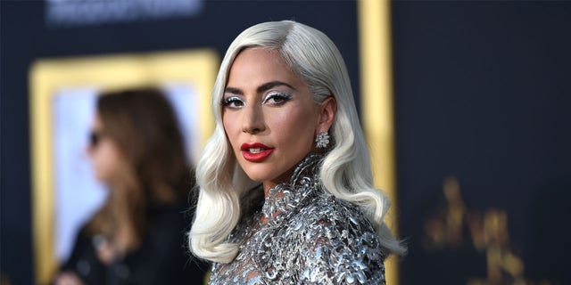 Lady Gaga offered a 0,000 reward before an unknown woman returned the dogs to the dogs.