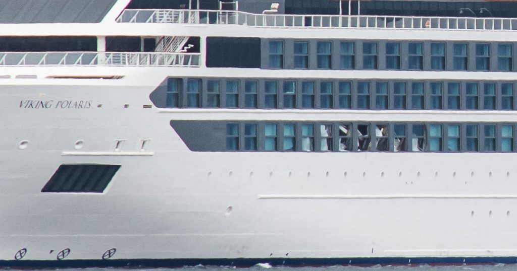 A "rogue wave" kills an American woman and injures four others on a cruise ship in Antarctica